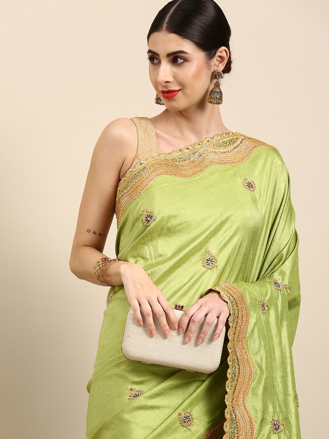 

Anouk Green & Golden Embellished & Embroidered Saree