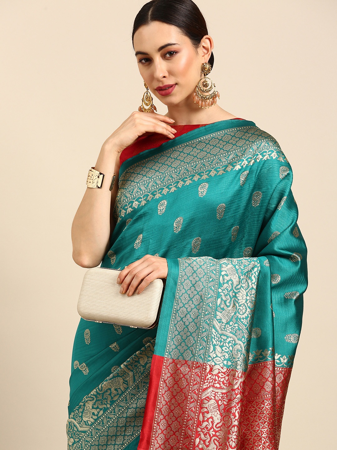 

Anouk Turquoise Blue & Maroon Woven Design Zari Silk Blend Banarasi Saree