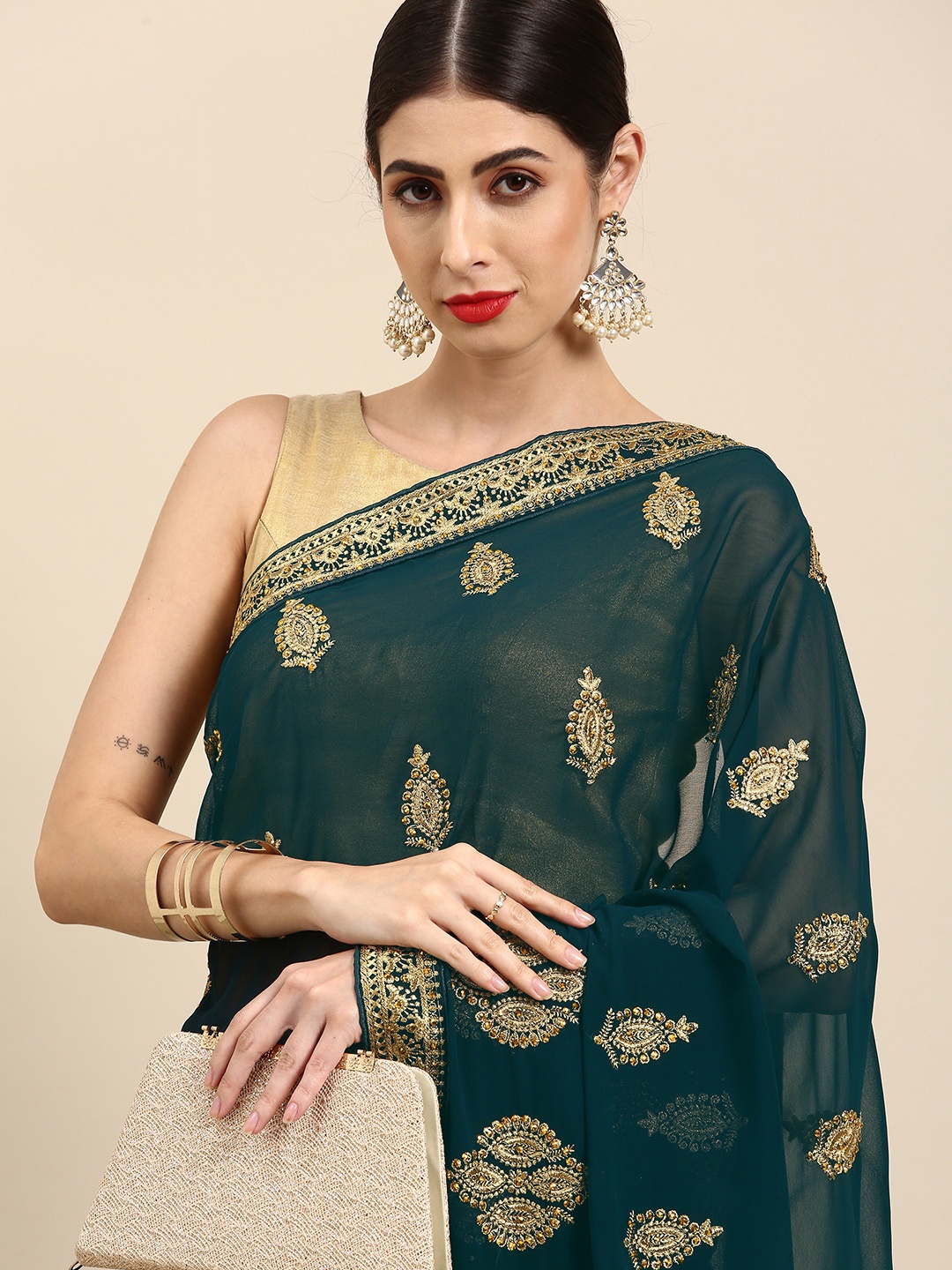 

Anouk Green & Golden Ethnic Motifs Embroidered Saree