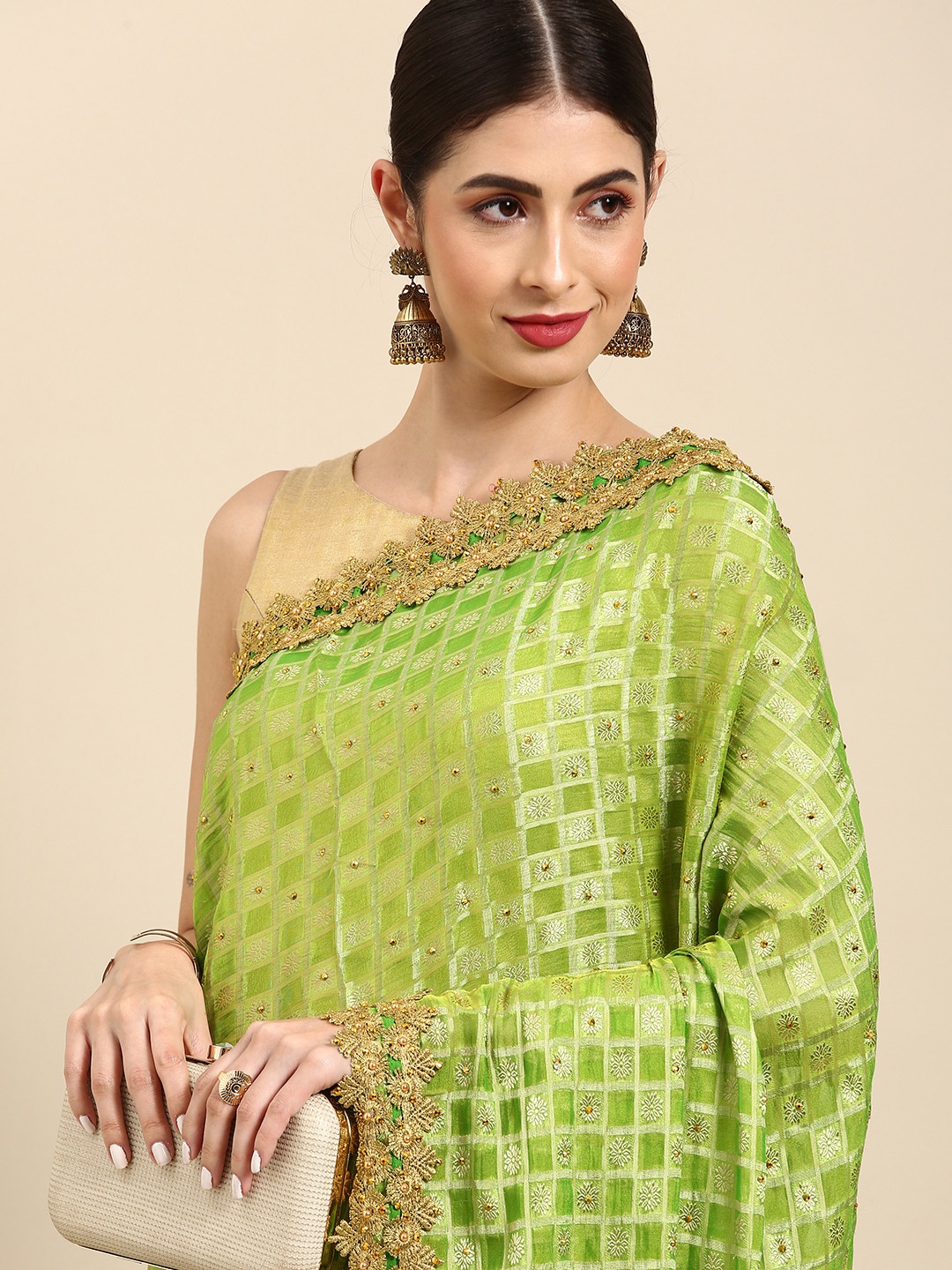 

Anouk Green & Golden Woven Design Beads and Stones Saree