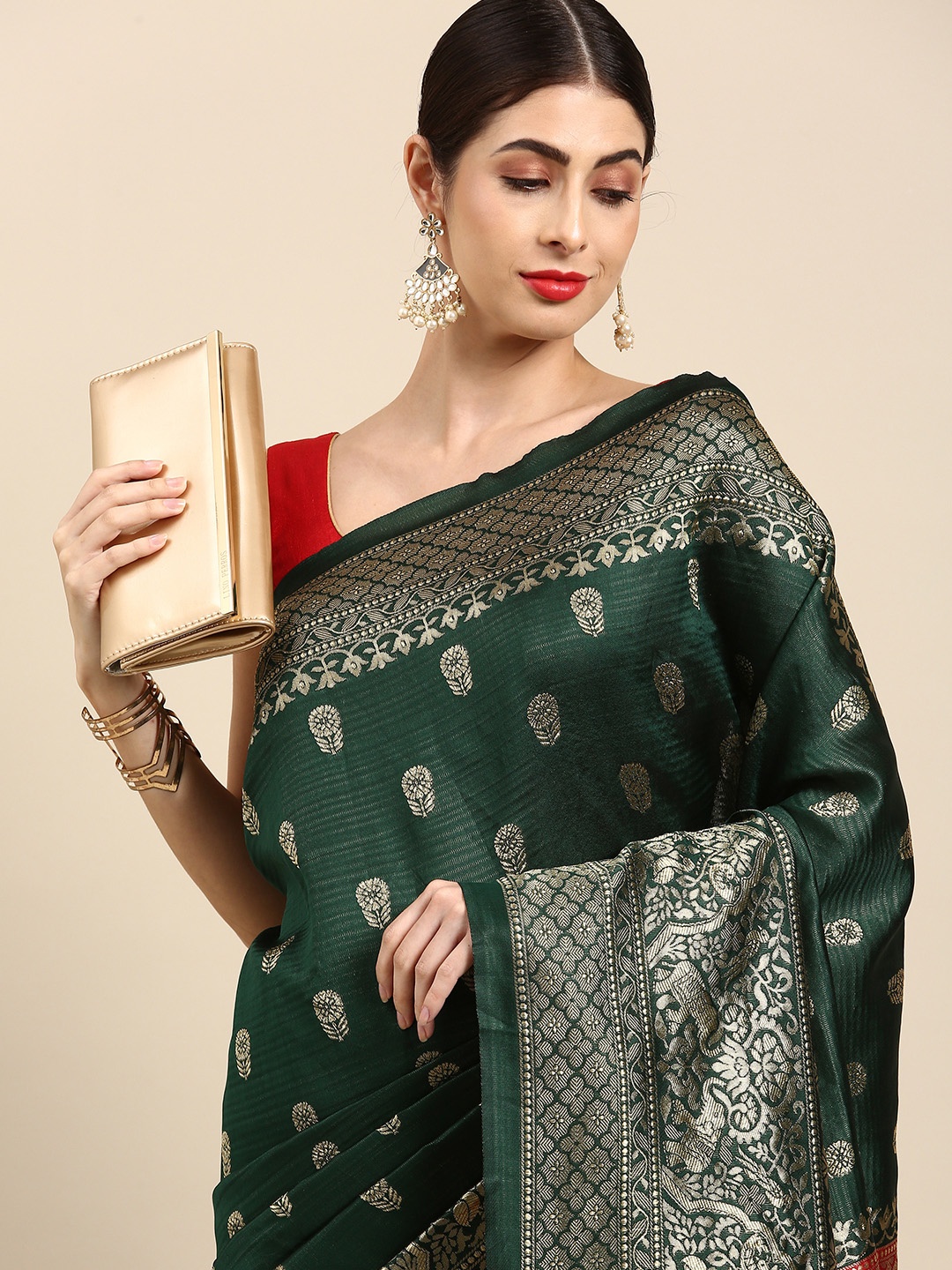 

Anouk Green & Golden Woven Design Zari Silk Blend Banarasi Saree