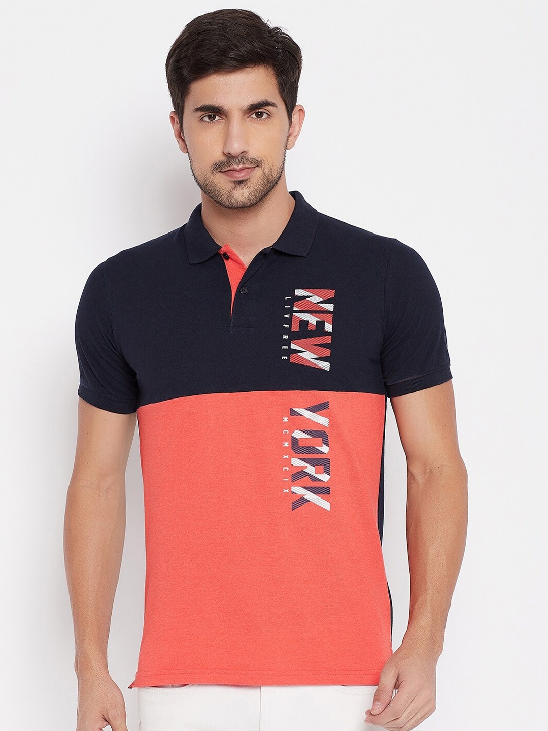 

NEVA Men Navy Blue & Peach-Coloured Colourblocked Polo Collar T-shirt