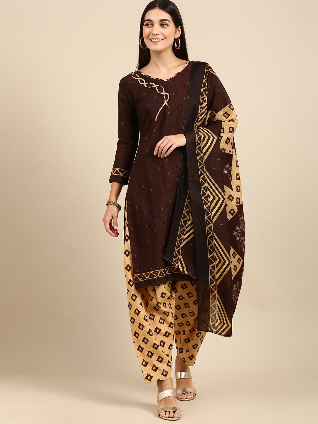 

Rajnandini Brown & Beige Printed Unstitched Dress Material