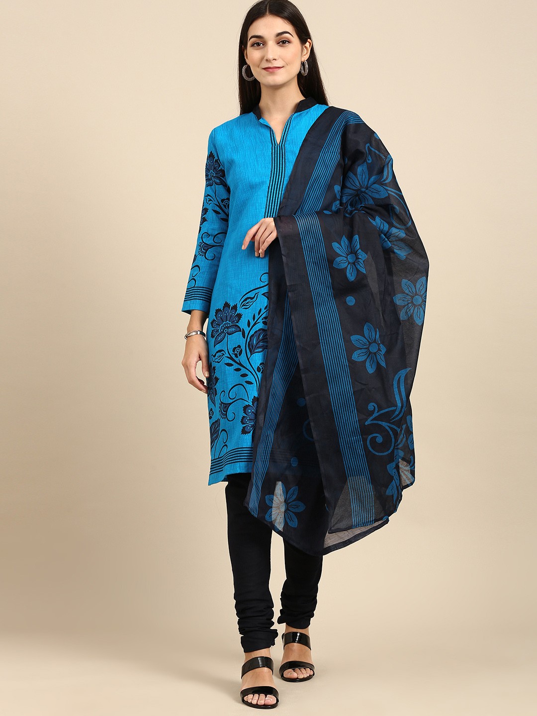 

Rajnandini Turquoise Blue Printed Unstitched Dress Material