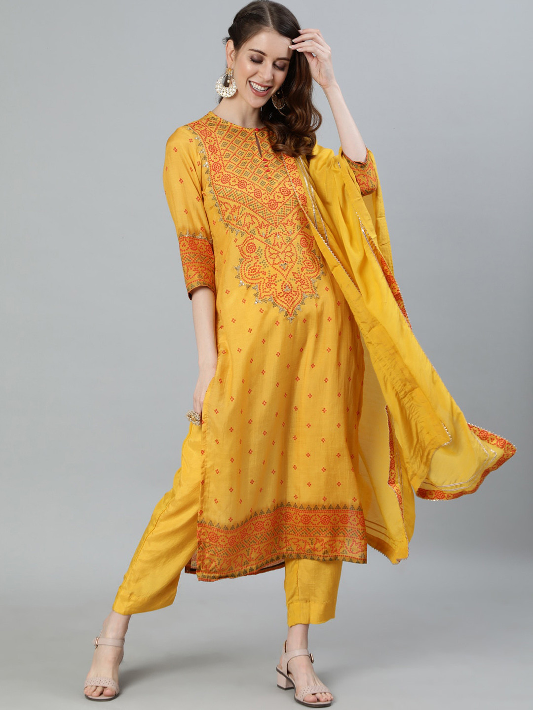 

Ishin Women Mustard Yellow Bandhani Printed Gotta Patti Kurta with Trousers & Dupatta