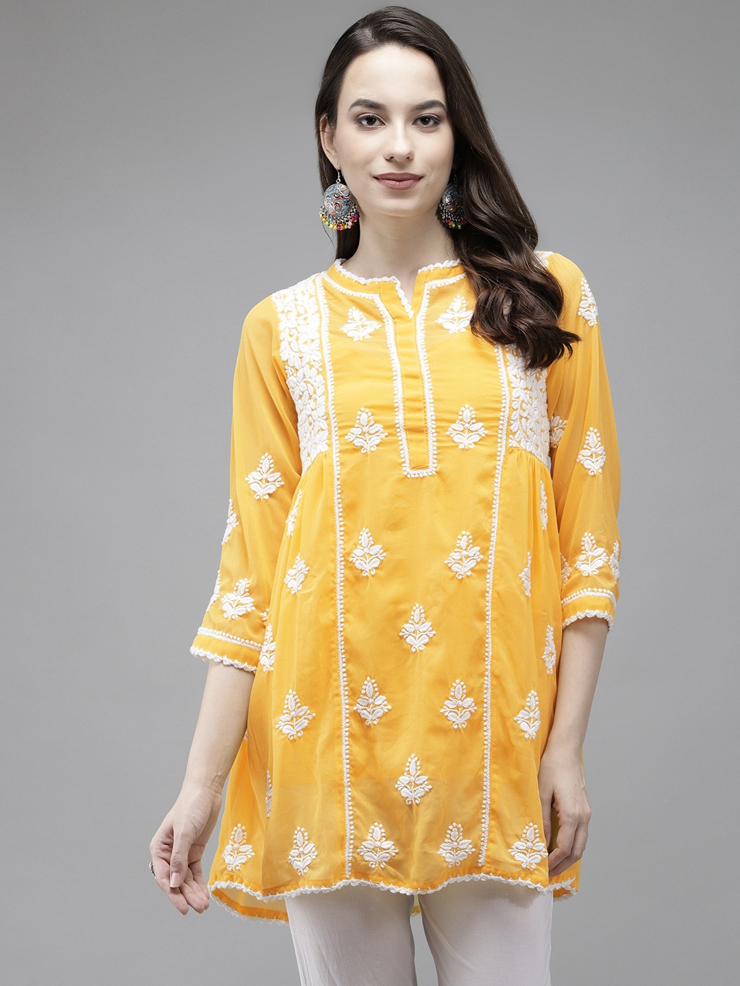 

ADA Yellow Ethnic Motifs Woven Design Pure Georgette Chikankari Kurti with Matching Slip