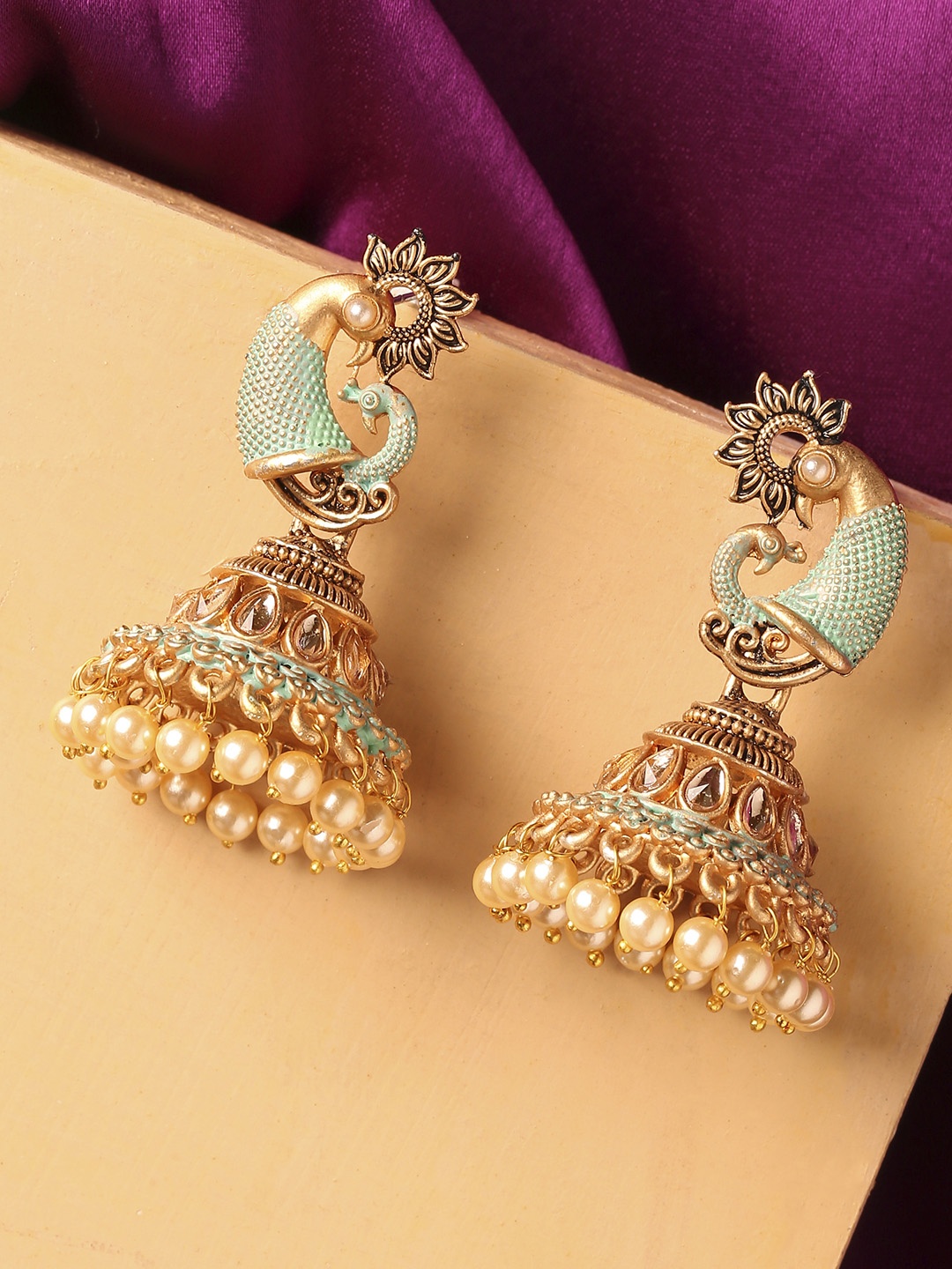 

OOMPH Green & Gold-Toned Peacock Shaped Gold Plated Handcrafted Jhumkas