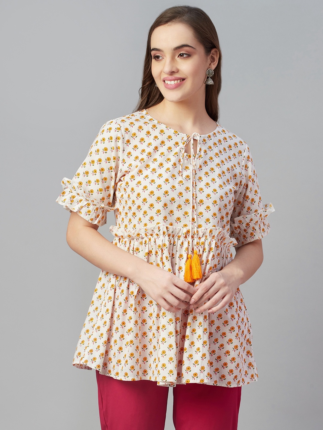 

Silai Bunai White & Yellow Ethnic Motifs Printed Pure Cotton Pleated Kurti