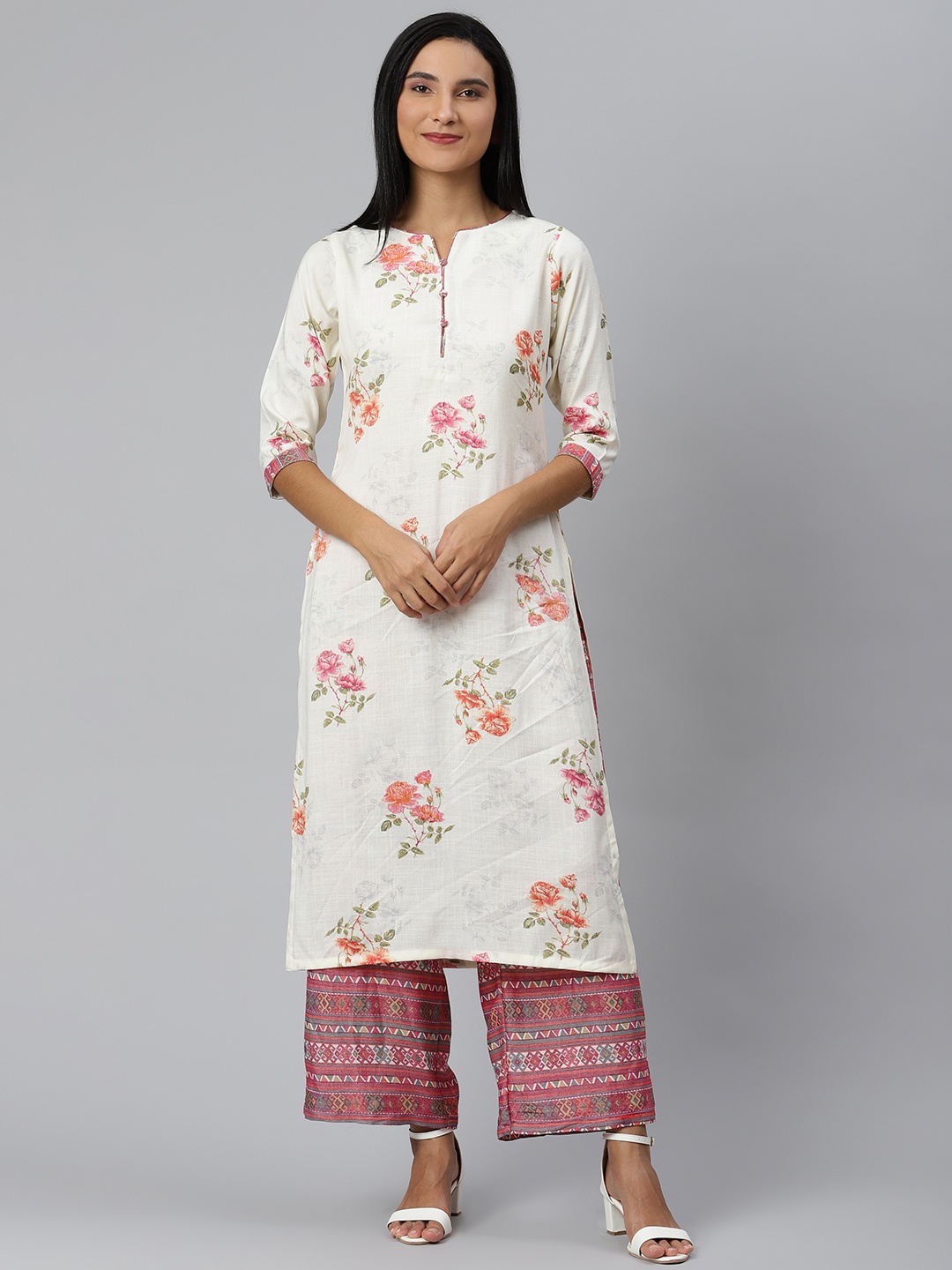 

Ives Women White Floral Printed Regular Kurta with Palazzos