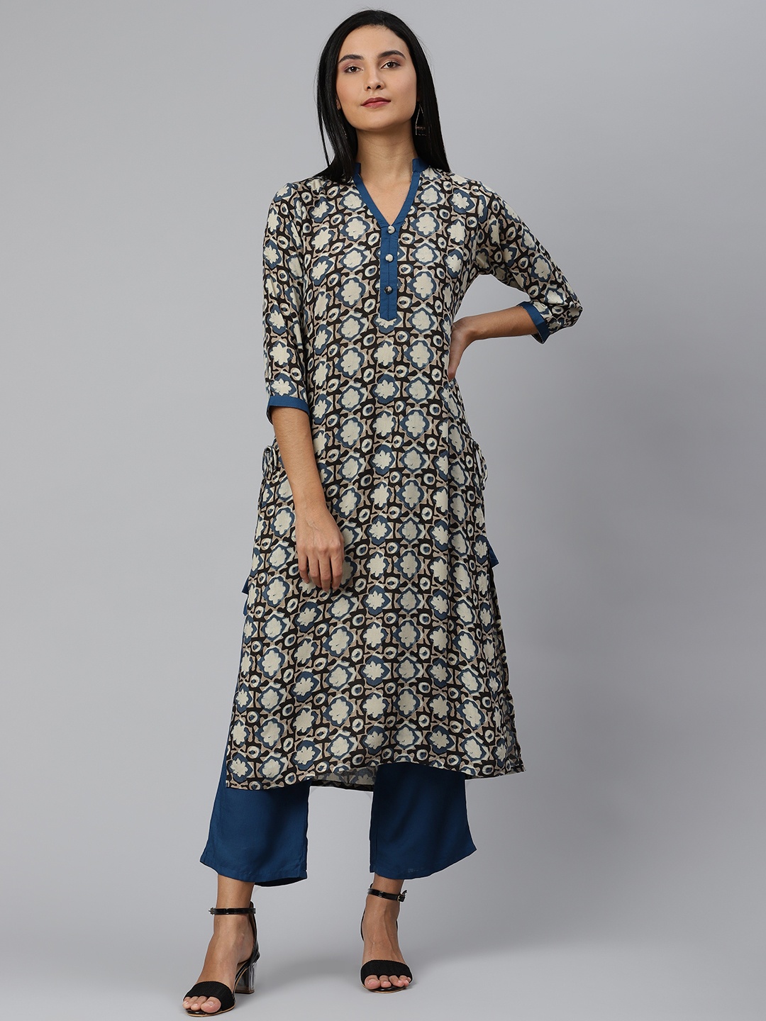 

Ives Women Beige & Blue Ethnic Motifs Printed Regular Kurta with Trousers