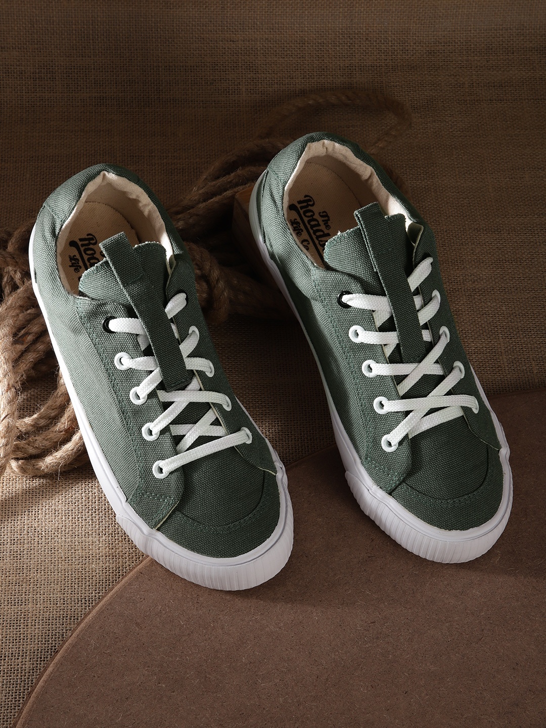 

Roadster Women Olive Green Solid Sneakers