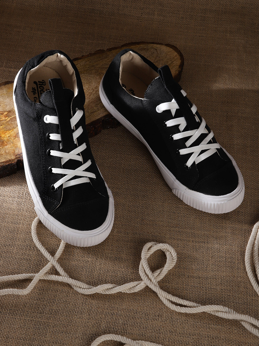 

Roadster Women Black Solid Sneakers