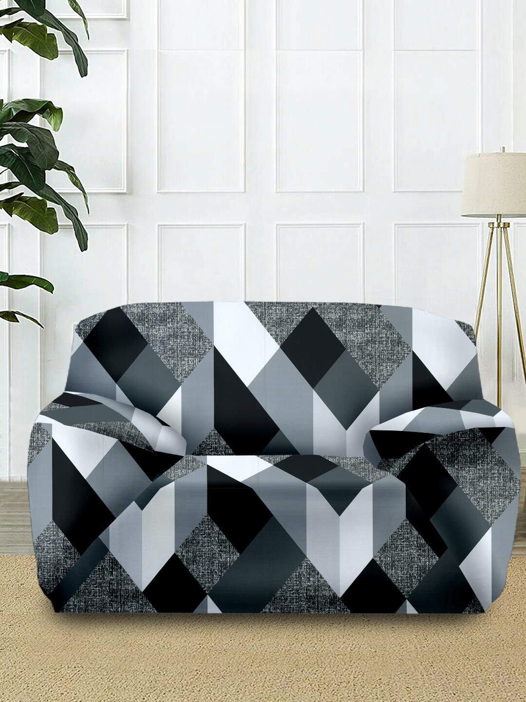 

Cortina Black & Grey Printed 1-Seater Stretchable Non-Slip Sofa Slipcover