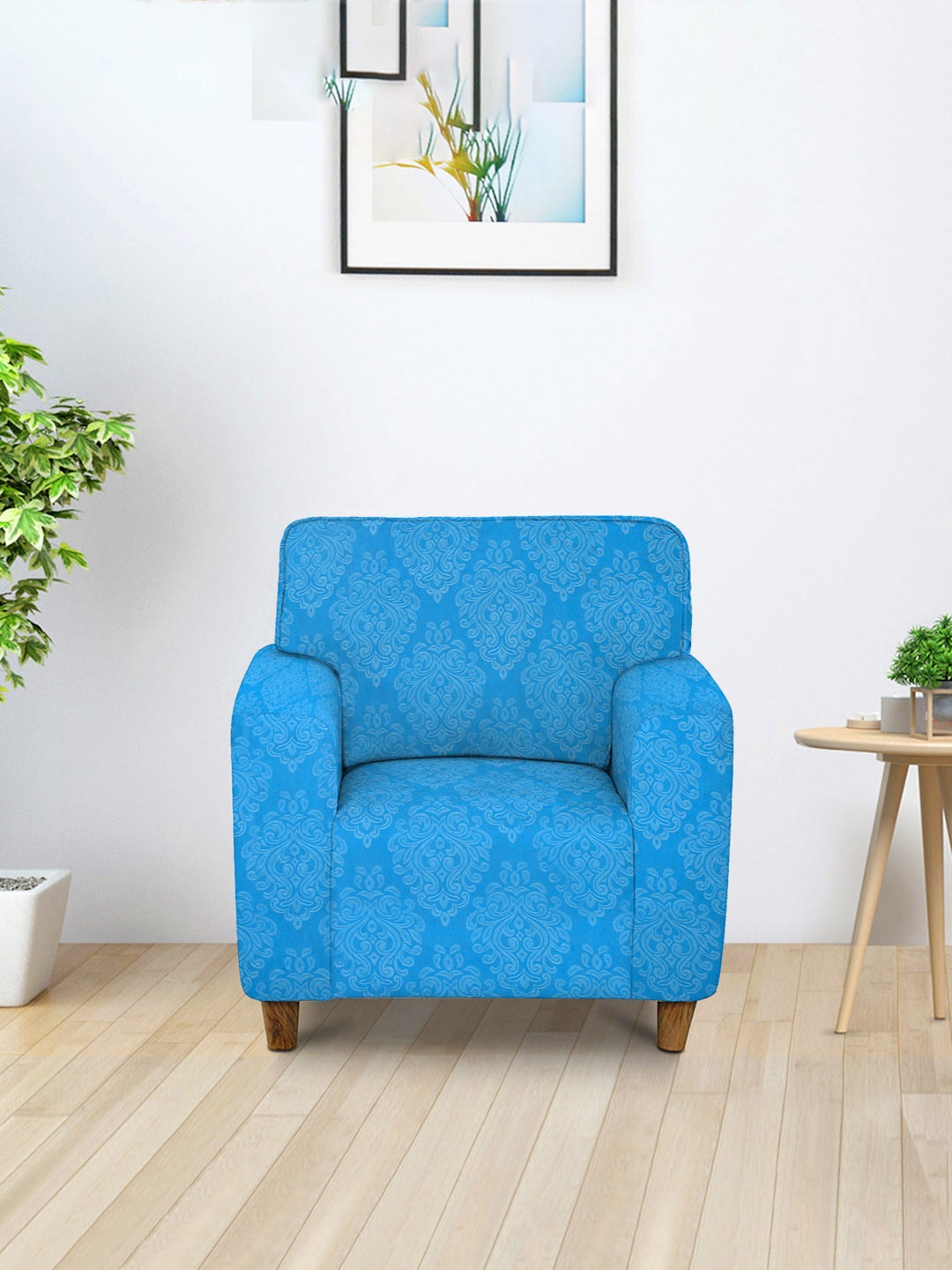 

Cortina Blue Printed One Seater Sofa Cover