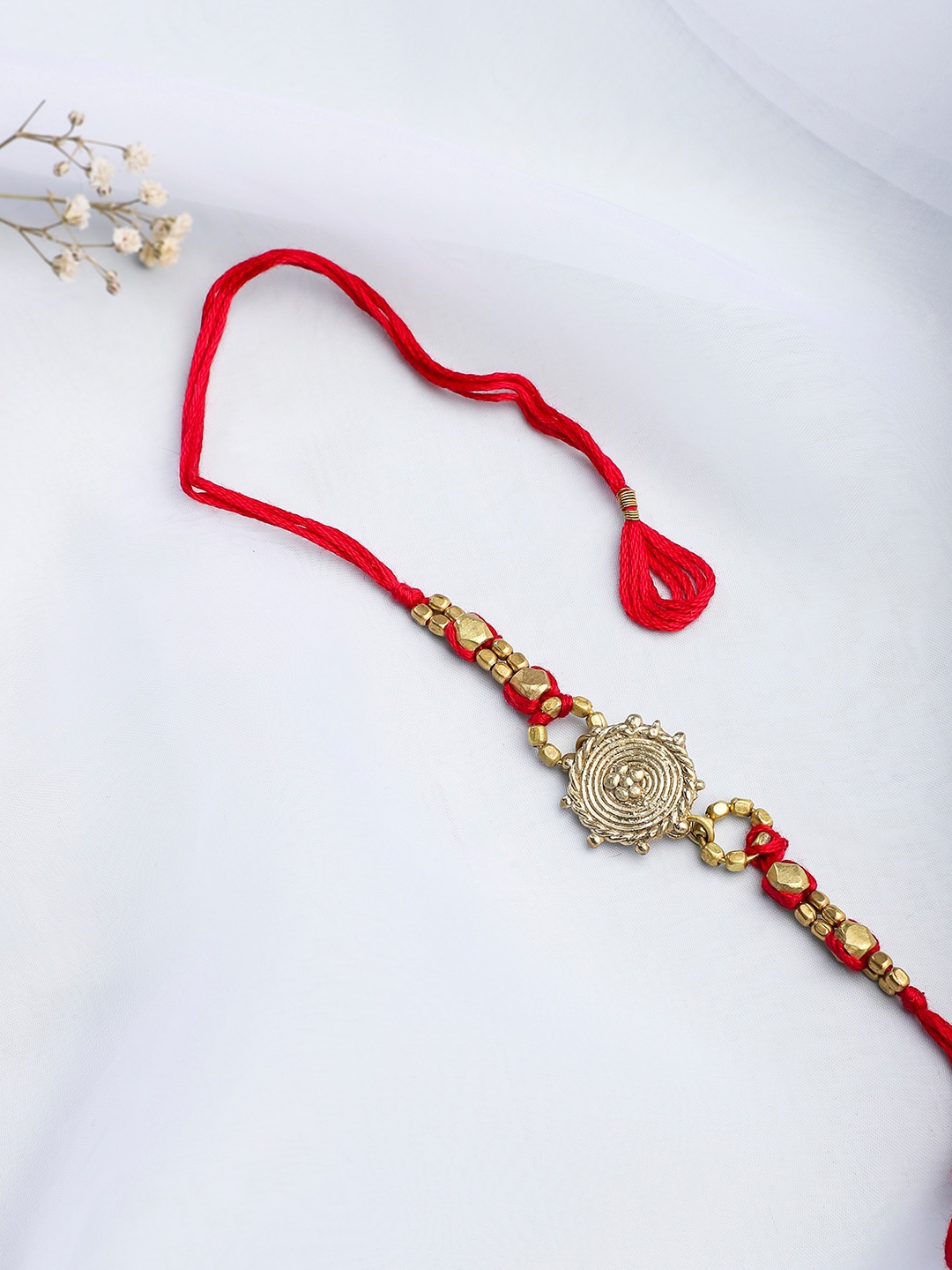 

Fabindia Red Embellished Rakhi