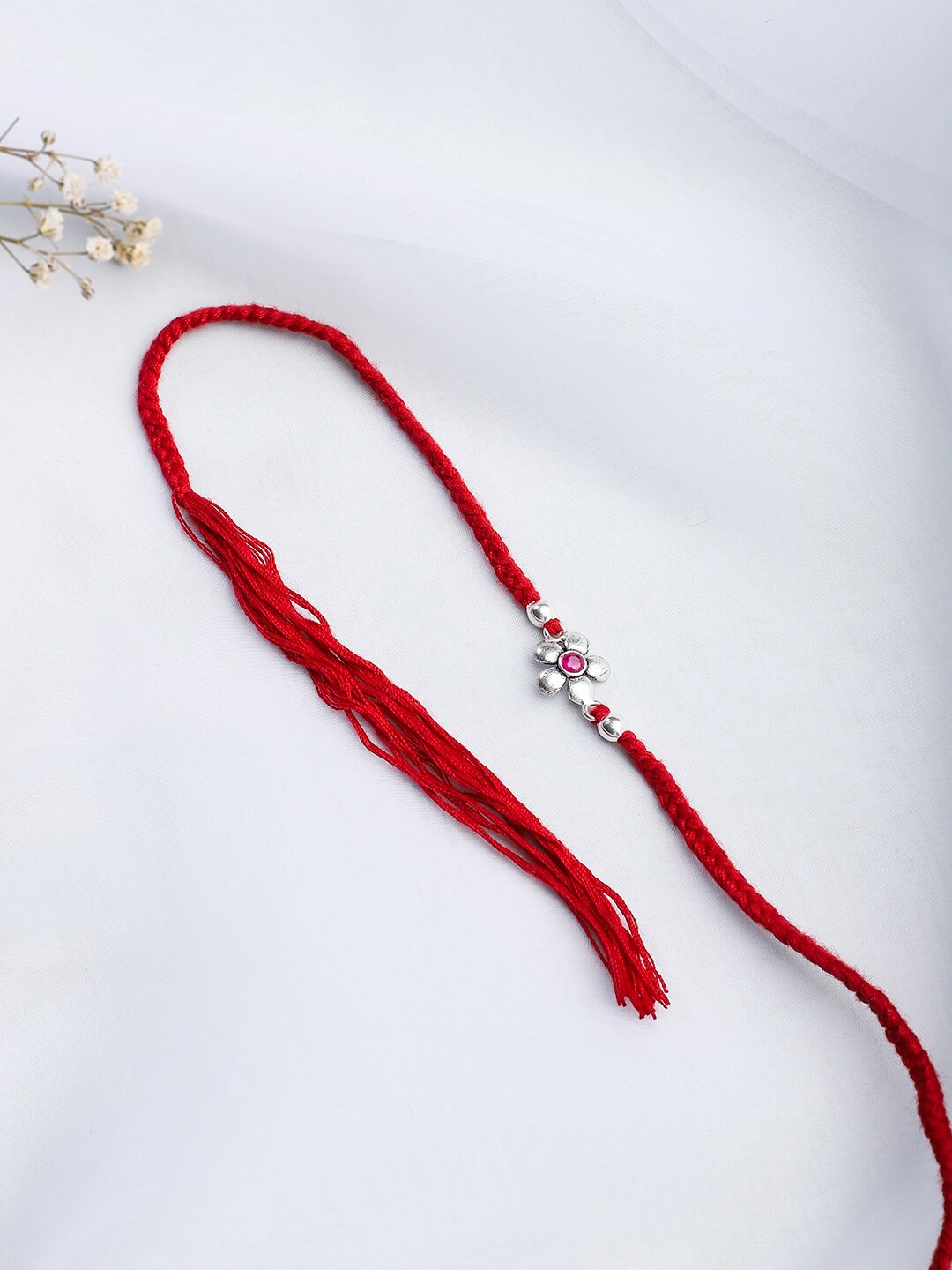 

Fabindia Red Embellished Rakhi