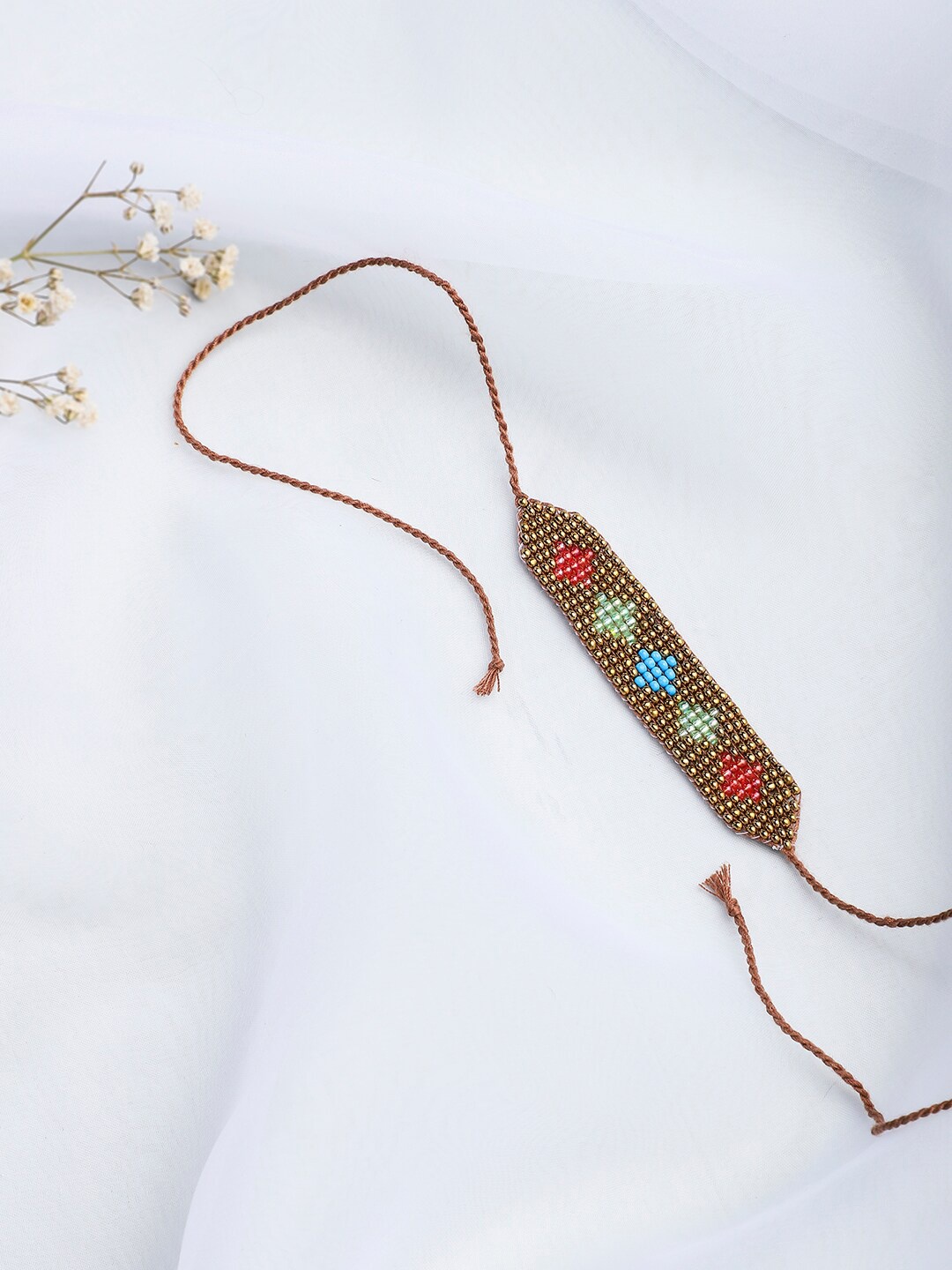 

Fabindia Multi-Coloured Embellished Rakhi