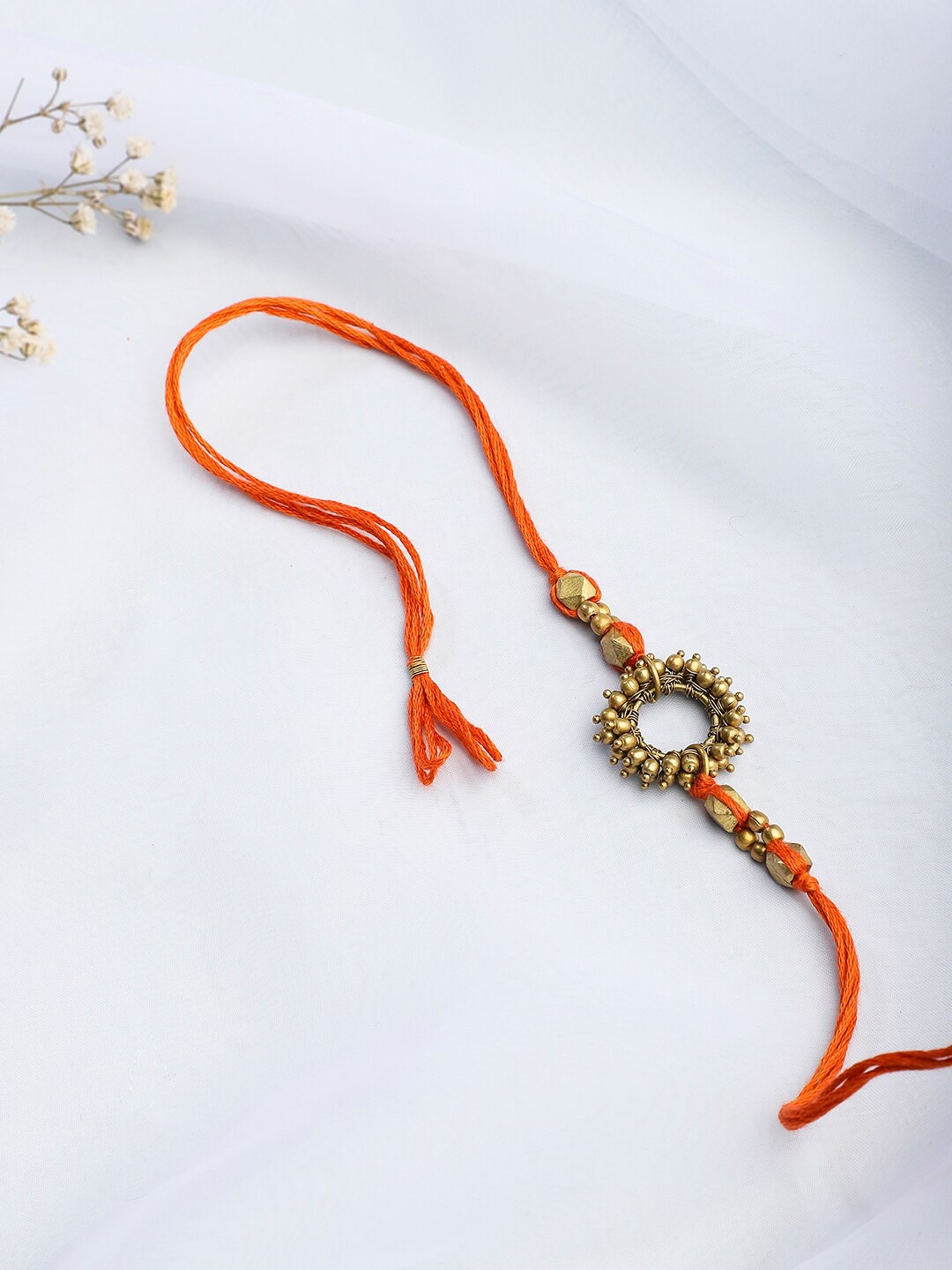 

Fabindia Orange Embellished Rakhi