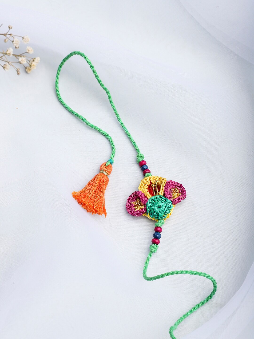 

Fabindia Green Woven Design Rakhi