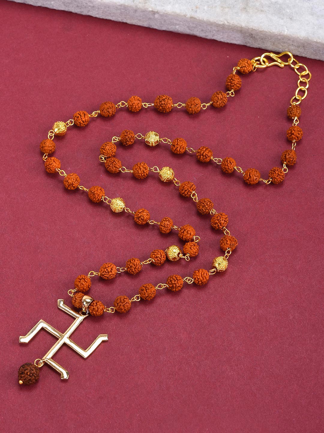 

Tistabene Gold Plated Swatik Rudraksha Pendant
