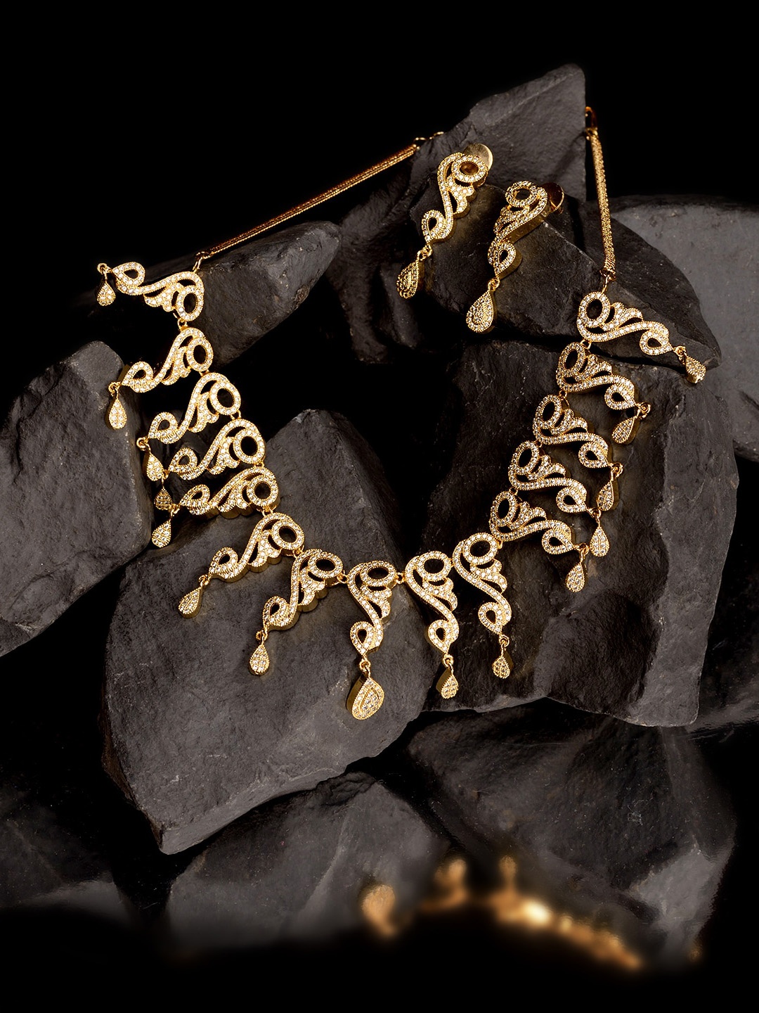 

Saraf RS Jewellery Gold-Plated White AD-Studded Antique Jewellery Set