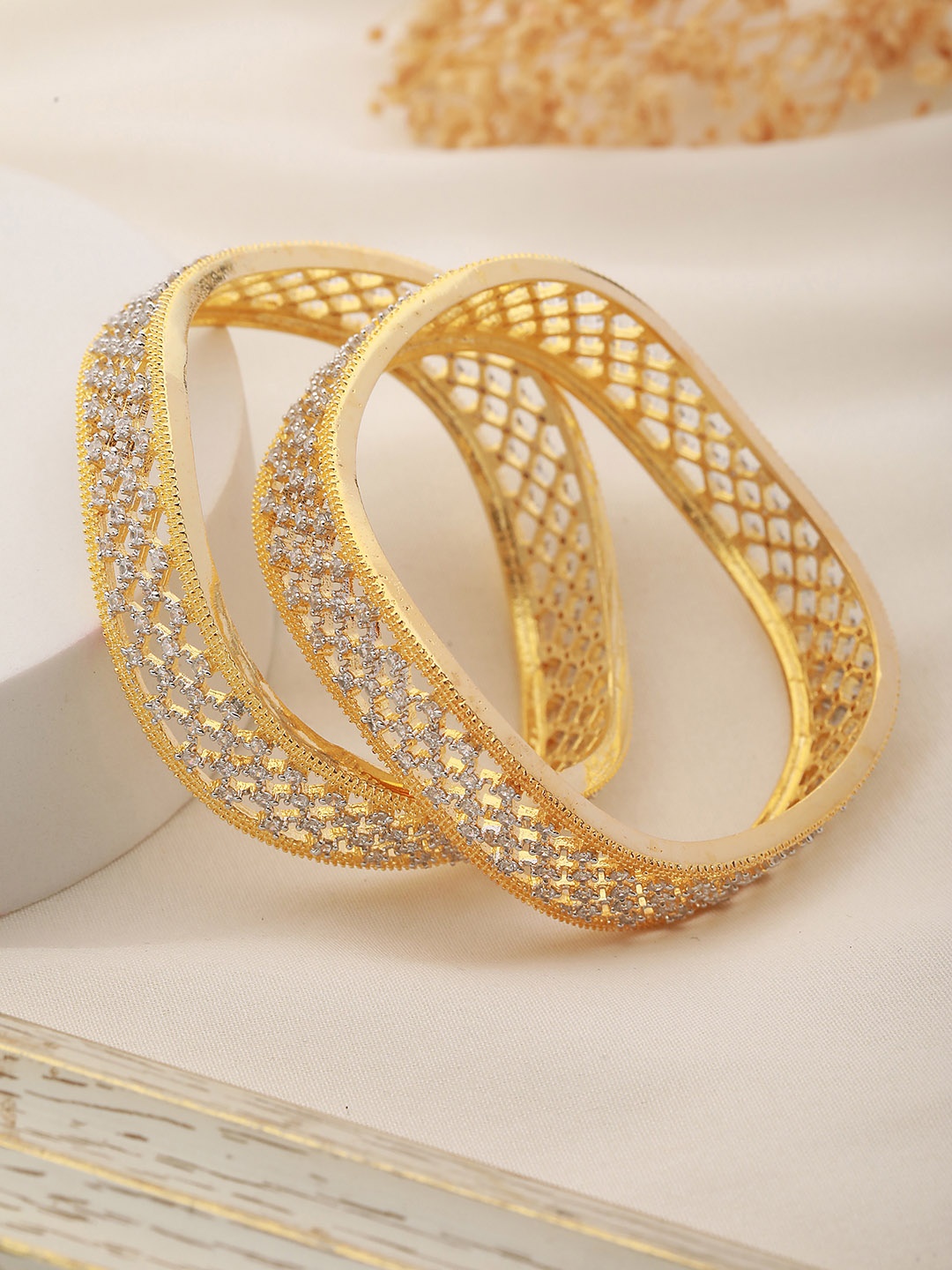 

Saraf RS Jewellery Set Of 2 Gold-Plated White AD-Studded Handcrafted Bangles