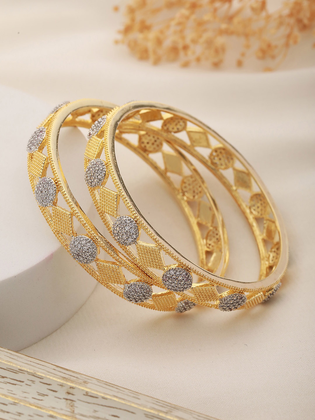 

Saraf RS Jewellery Set Of 2 Gold-Plated & White AD Studded Handcrafted Bangles
