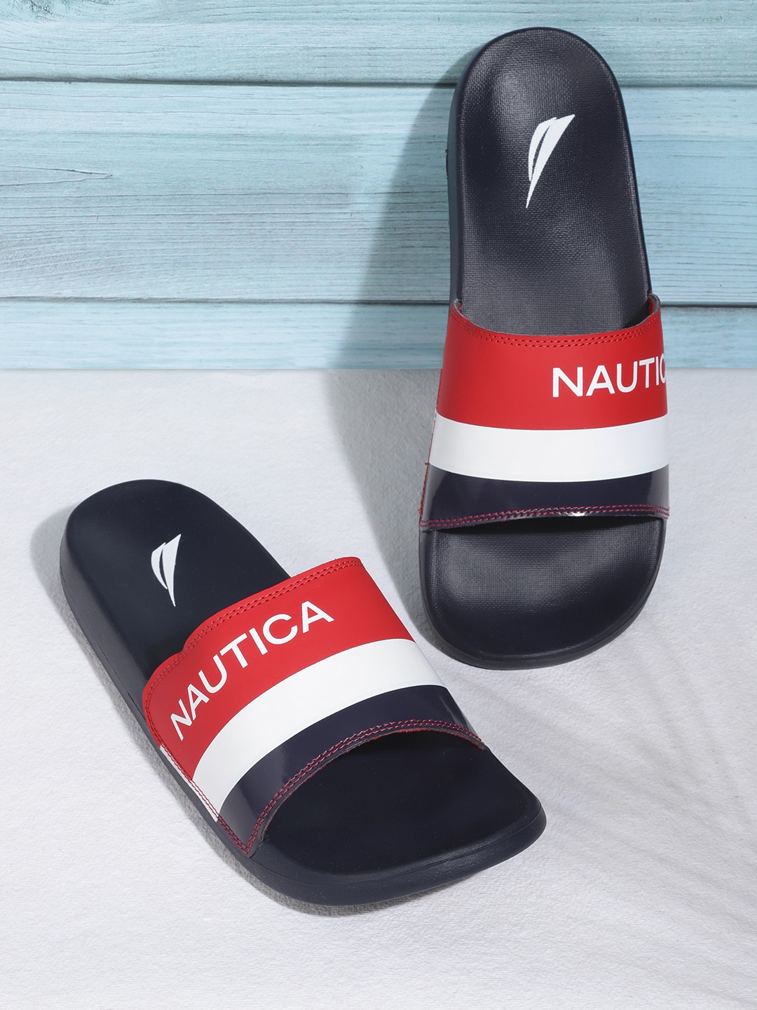 

Nautica Men Red & White Colourblocked Sliders with Brand Logo Print Detail