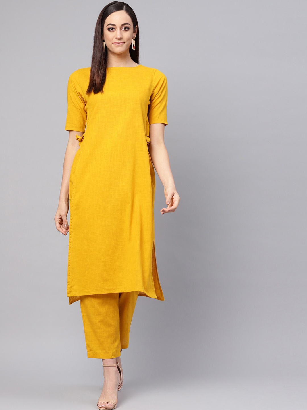 

Idalia Women Mustard Yellow High Slit Pure Cotton Kurta with Trousers