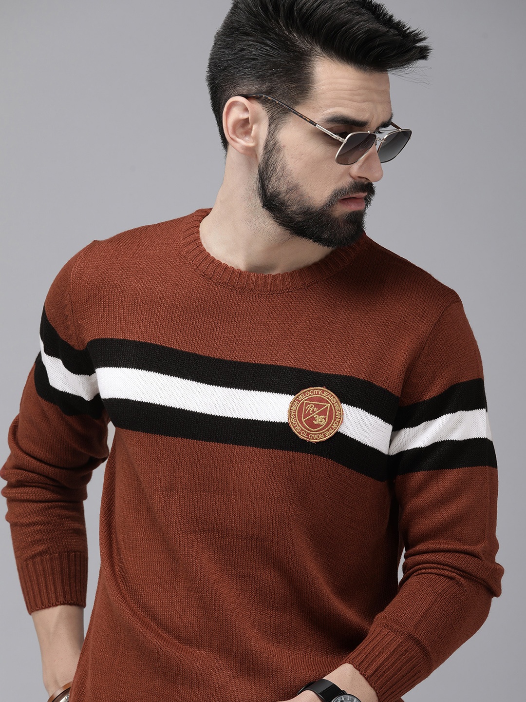 

Roadster Men Brown & Black Colourblocked Acrylic Pullover with Applique Detail