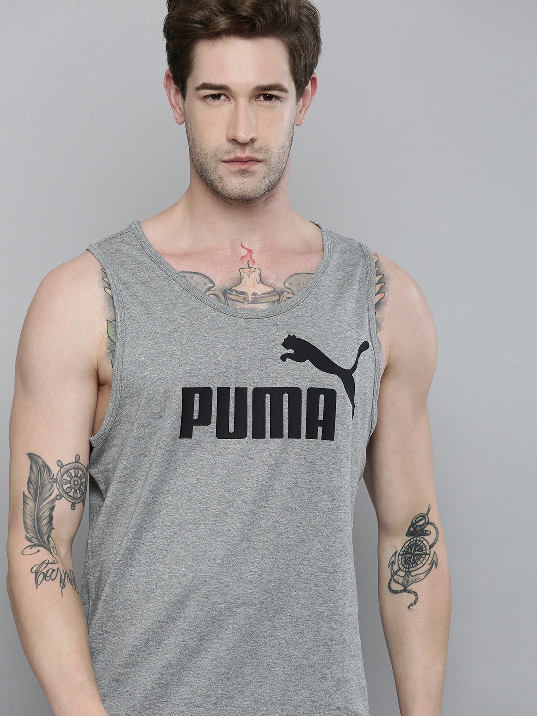 

Puma Men Grey Brand Logo Printed Essential Pure Cotton T-shirt