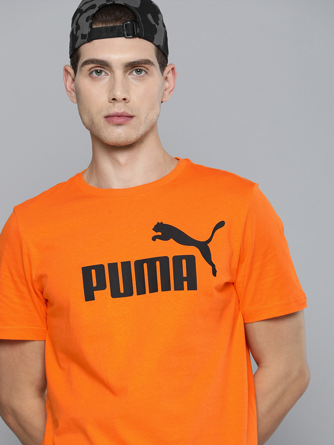 

Puma Men Orange Essentials Logo Printed Pure Cotton T-shirt