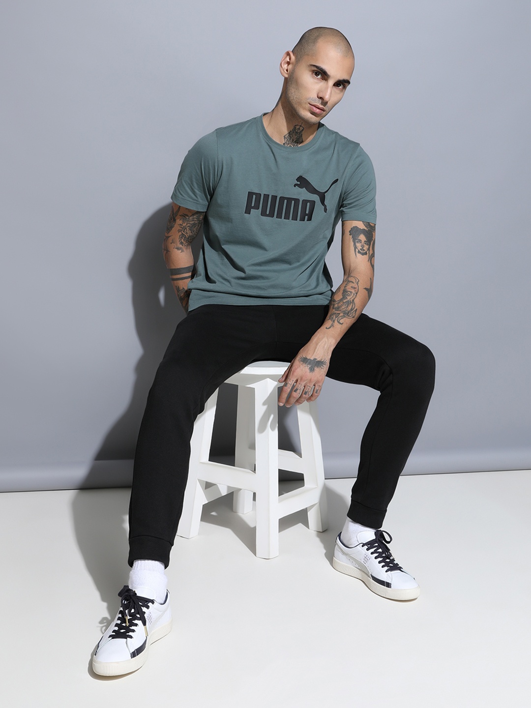 

Puma Men Green Essentials Logo Printed Pure Cotton T-shirt