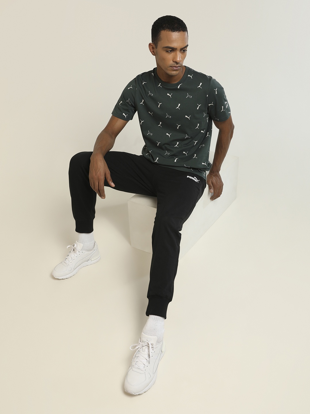 

Puma Men Green & White Brand Logo Printed Classics Graphics AOP T-shirt