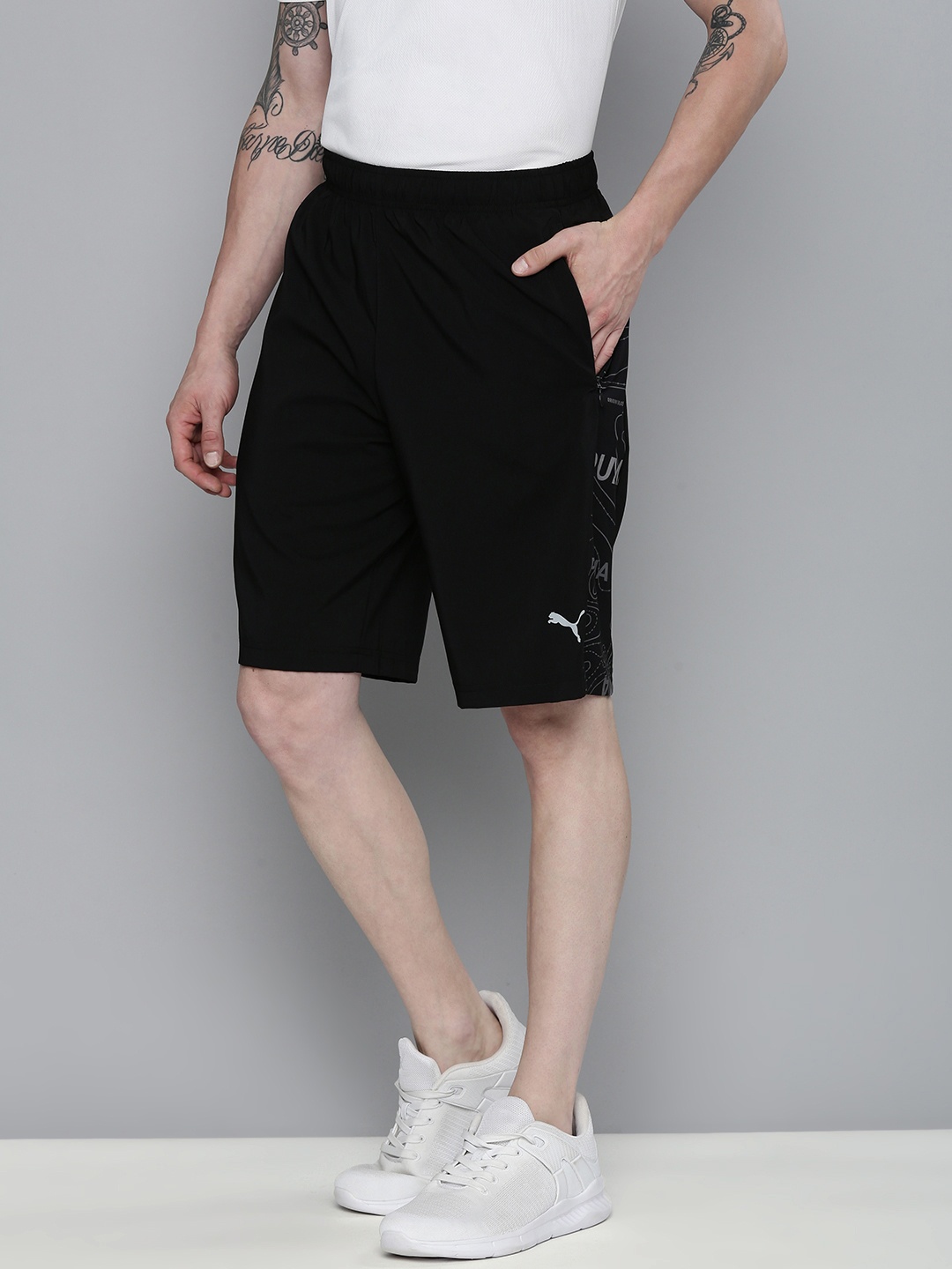 

one8 x PUMA Men Black Printed Virat Kohli Active Regular Sports Shorts