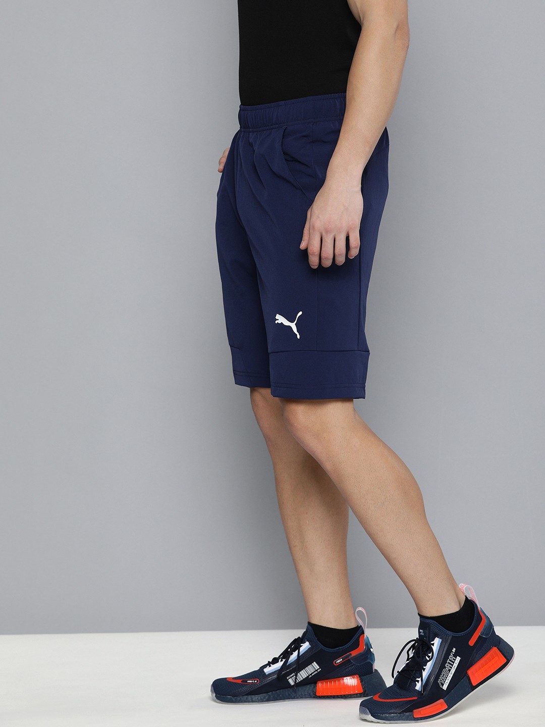 

Puma Men Navy Blue RTG Woven Brand Logo Printed Sports Shorts