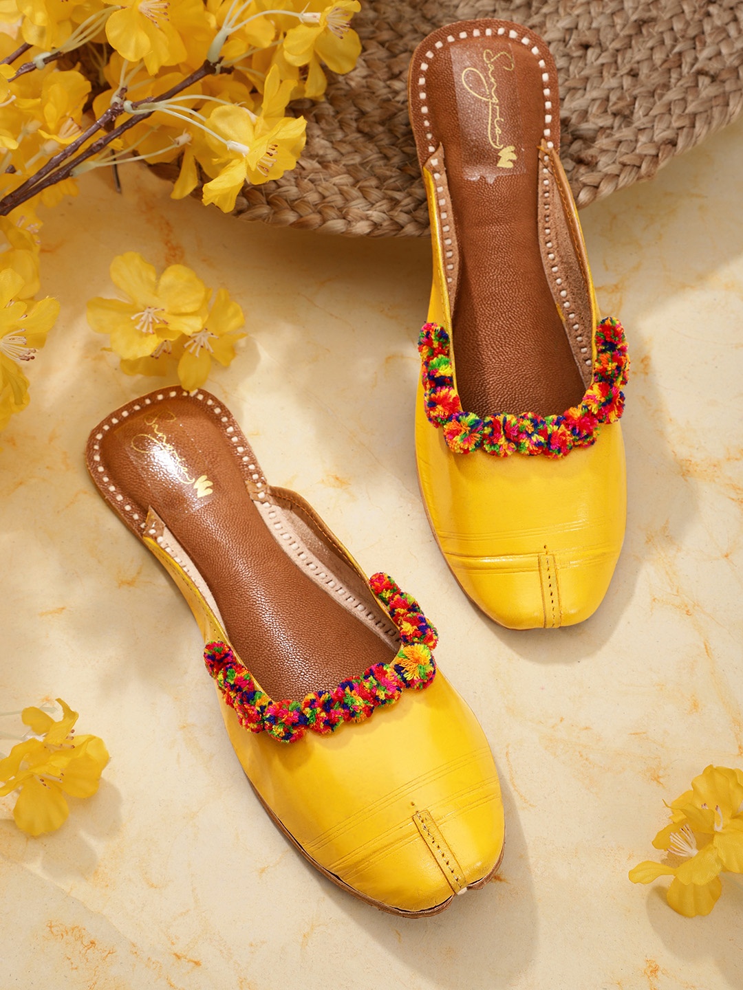 

Sangria Women Yellow Ethnic Mules with Pom Pom Detail
