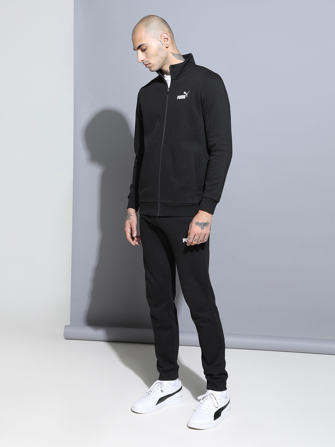 

Puma Men Black Solid Slim Fit Track Suit