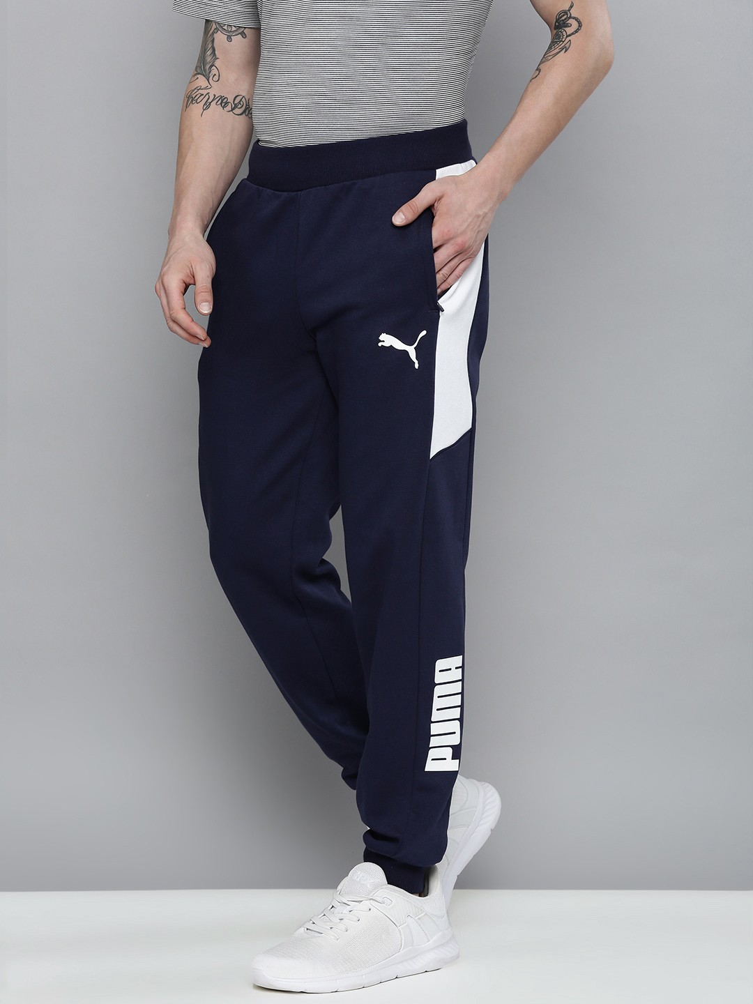 

Puma Men Navy Blue Solid Modern Sports Regular Fit Joggers With Side Stripes
