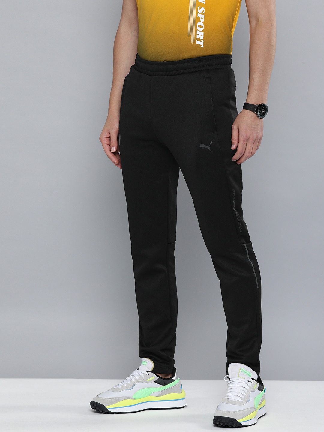 

PUMA Motorsport Men Black Solid dryCELL Ferrari Style T7 Motorsports Track Pants