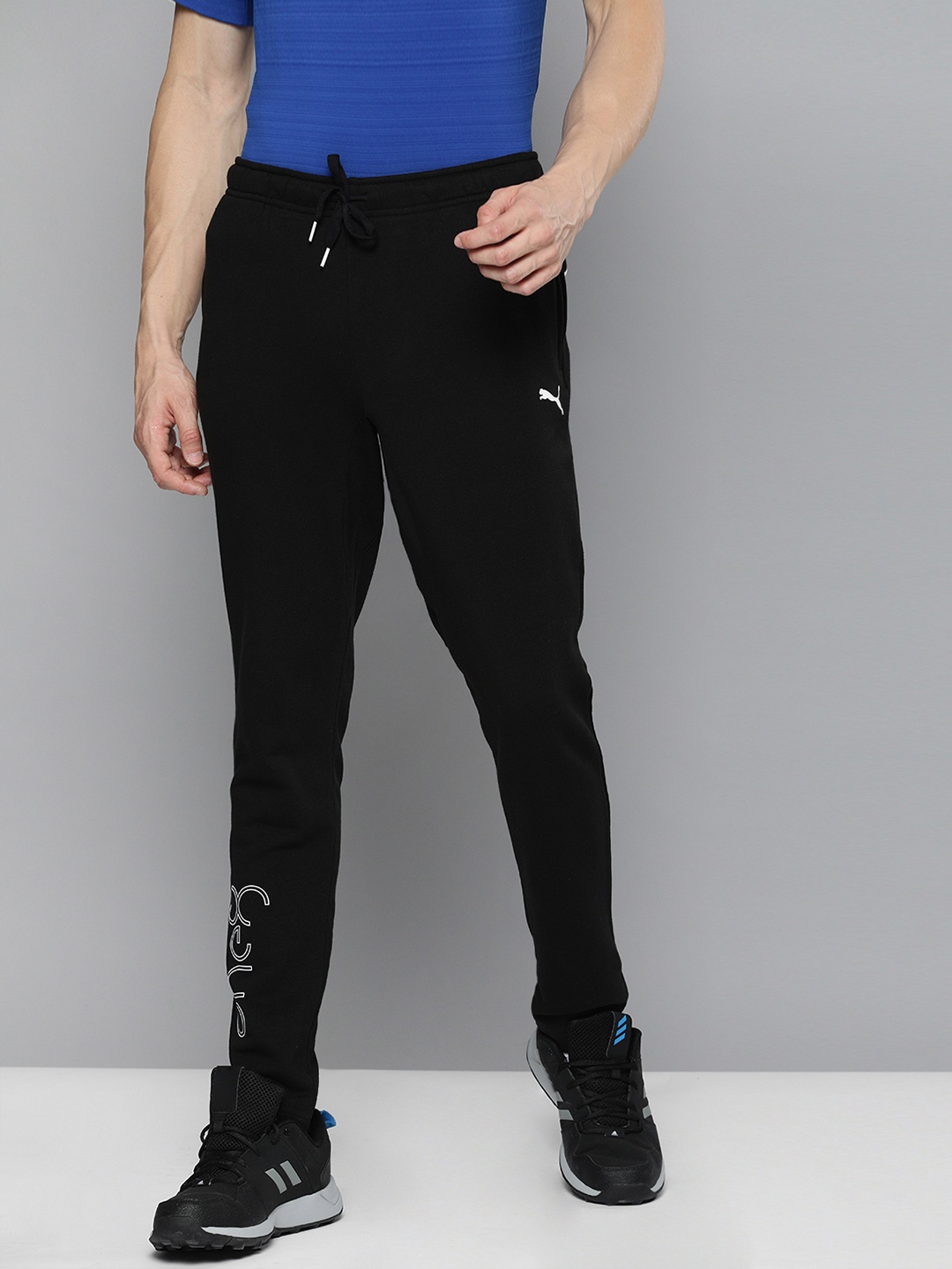 

one8 x PUMA Men Slim Fit Virat Kohli Logo Track Pants, Black
