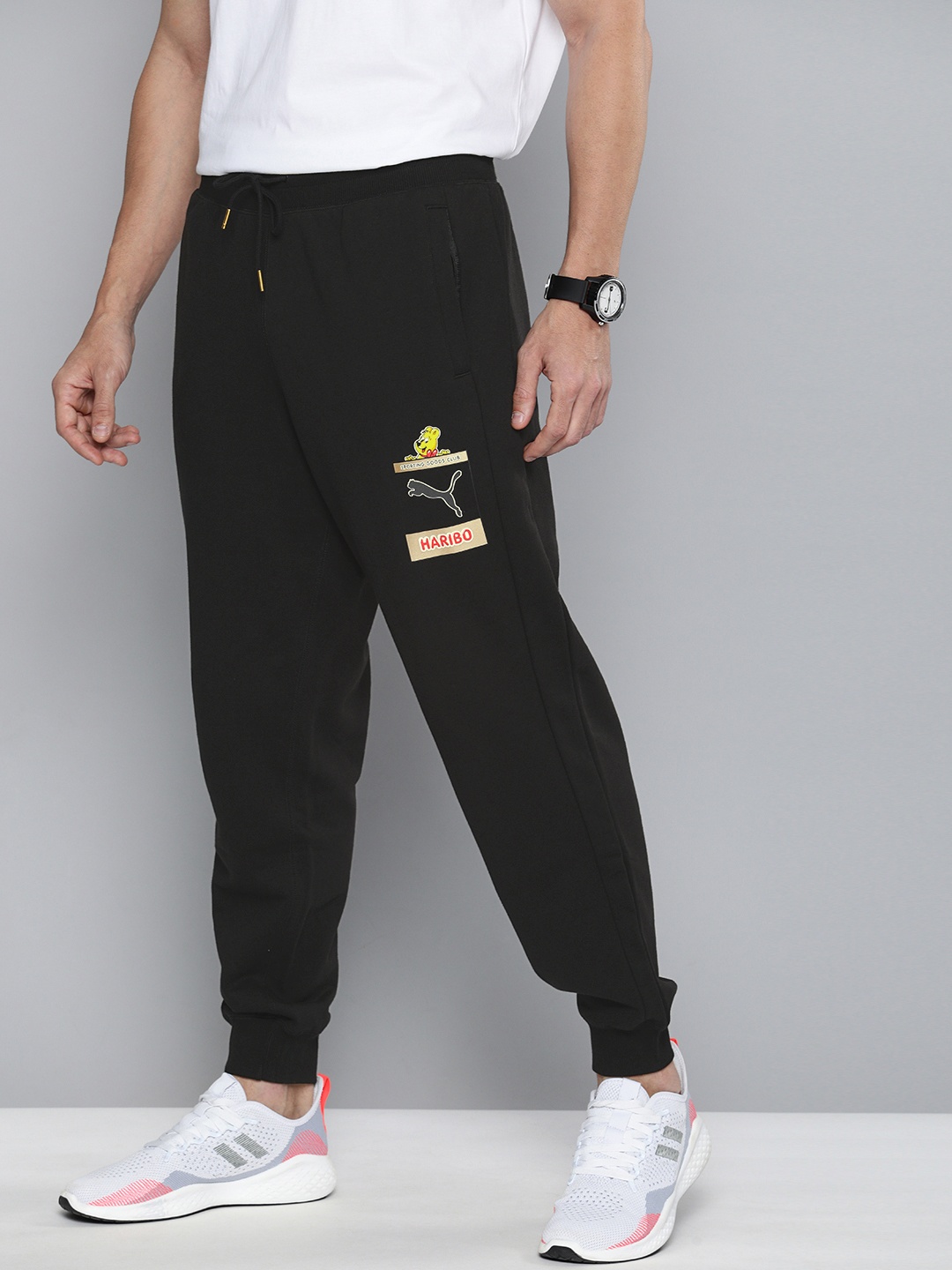 

PUMA x HARIBO Unisex Black Logo Printed Relaxed Fit Pure Cotton Sweat Pants