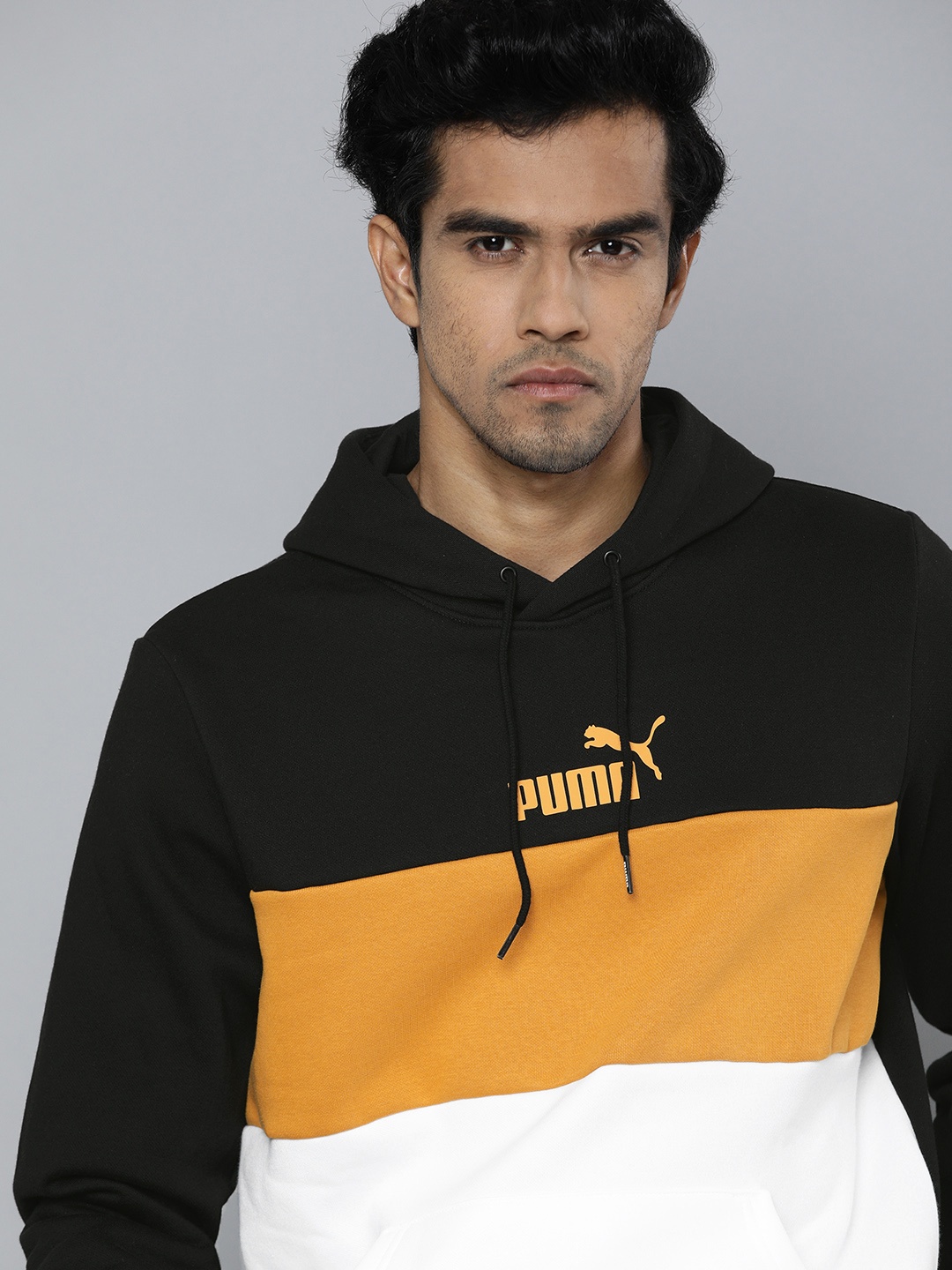 

Puma Men Black & White Colourblocked Regular Fit Essentials Hooded Sweatshirt