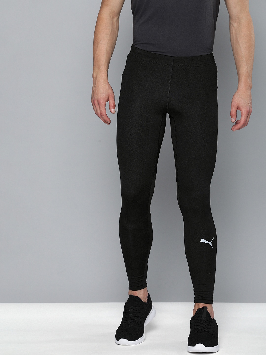 

Puma Men Black Solid Slim Fit dryCELL Running Tights