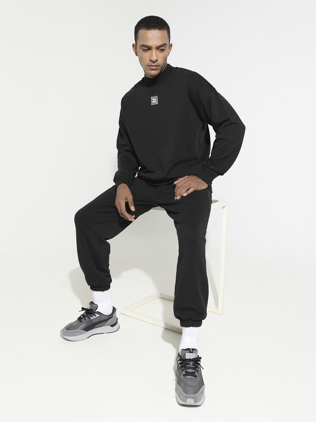 

Puma Unisex Black Brand Logo Printed RE.GEN Relaxed Fit Sweatshirt