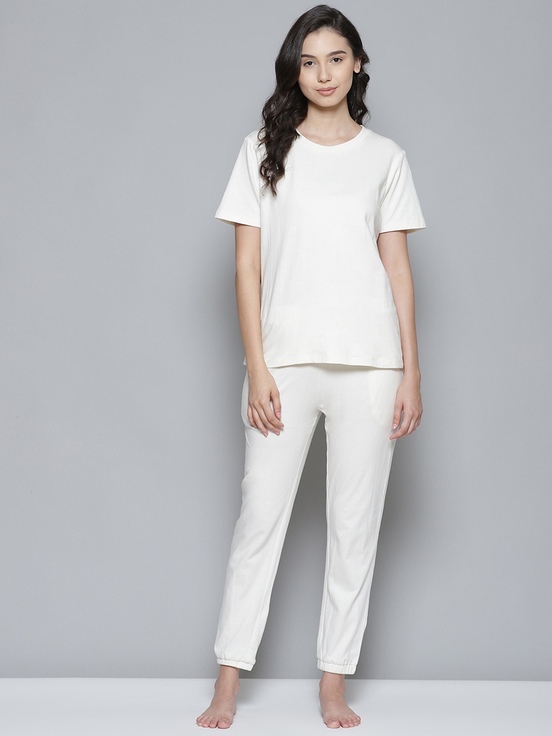 

Femella Women Off White Solid Cotton Pyjama Set