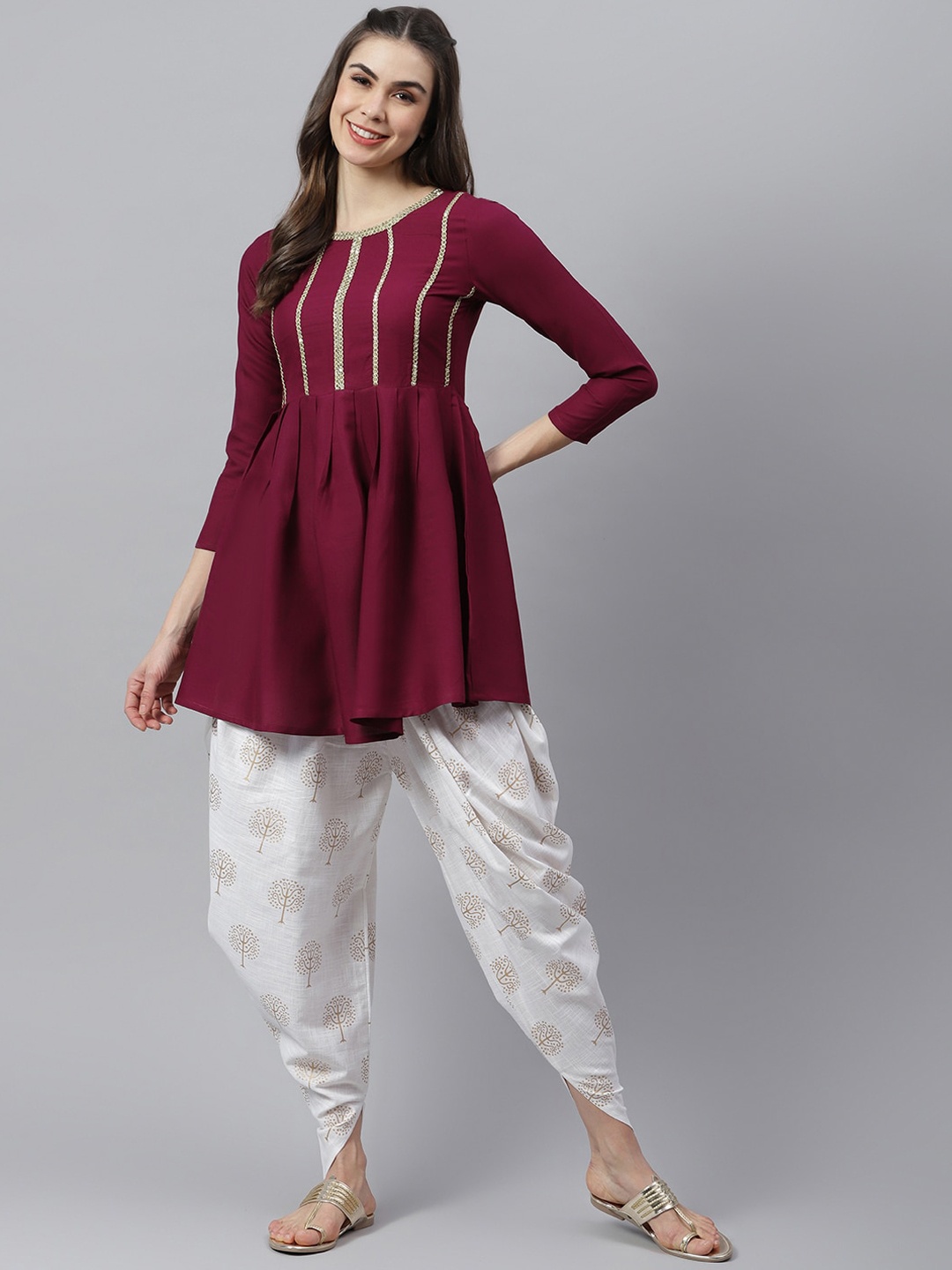 

Stylum Women Burgundy Yoke Design Pleated Thread Work Kurta with Dhoti Pants