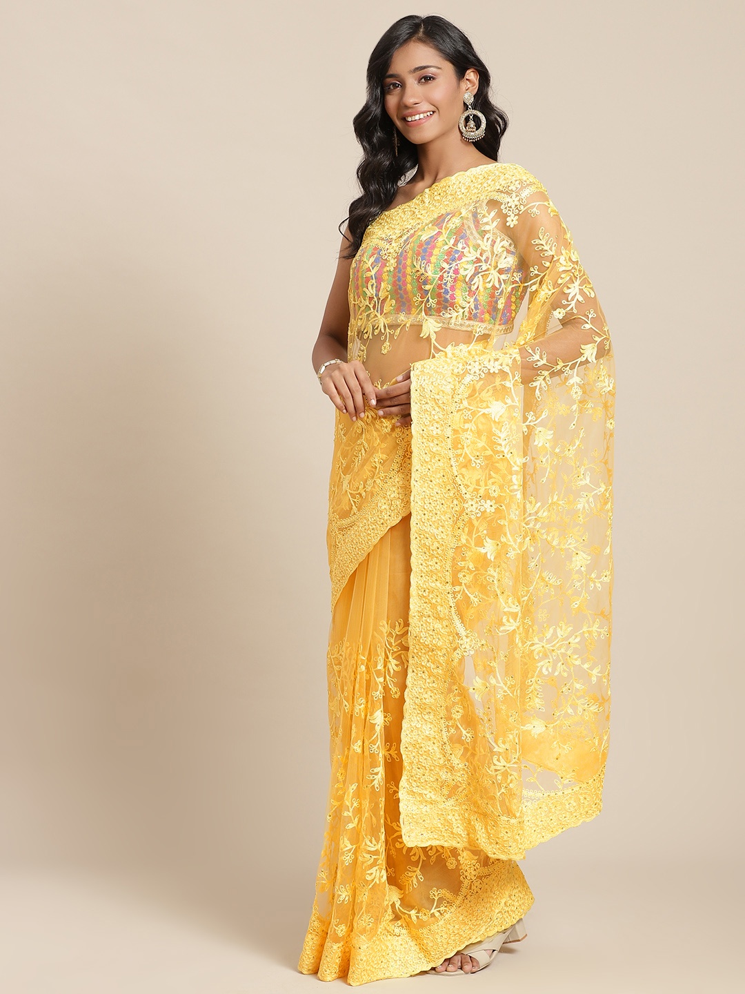 

Chhabra 555 Yellow Ethnic Embroidered Saree