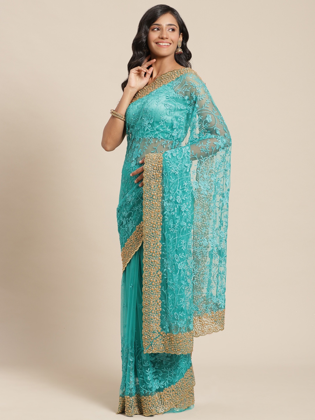 

Chhabra 555 Turquoise Green & Golden Ethnic Motifs Embroidered Net Heavy Work Saree