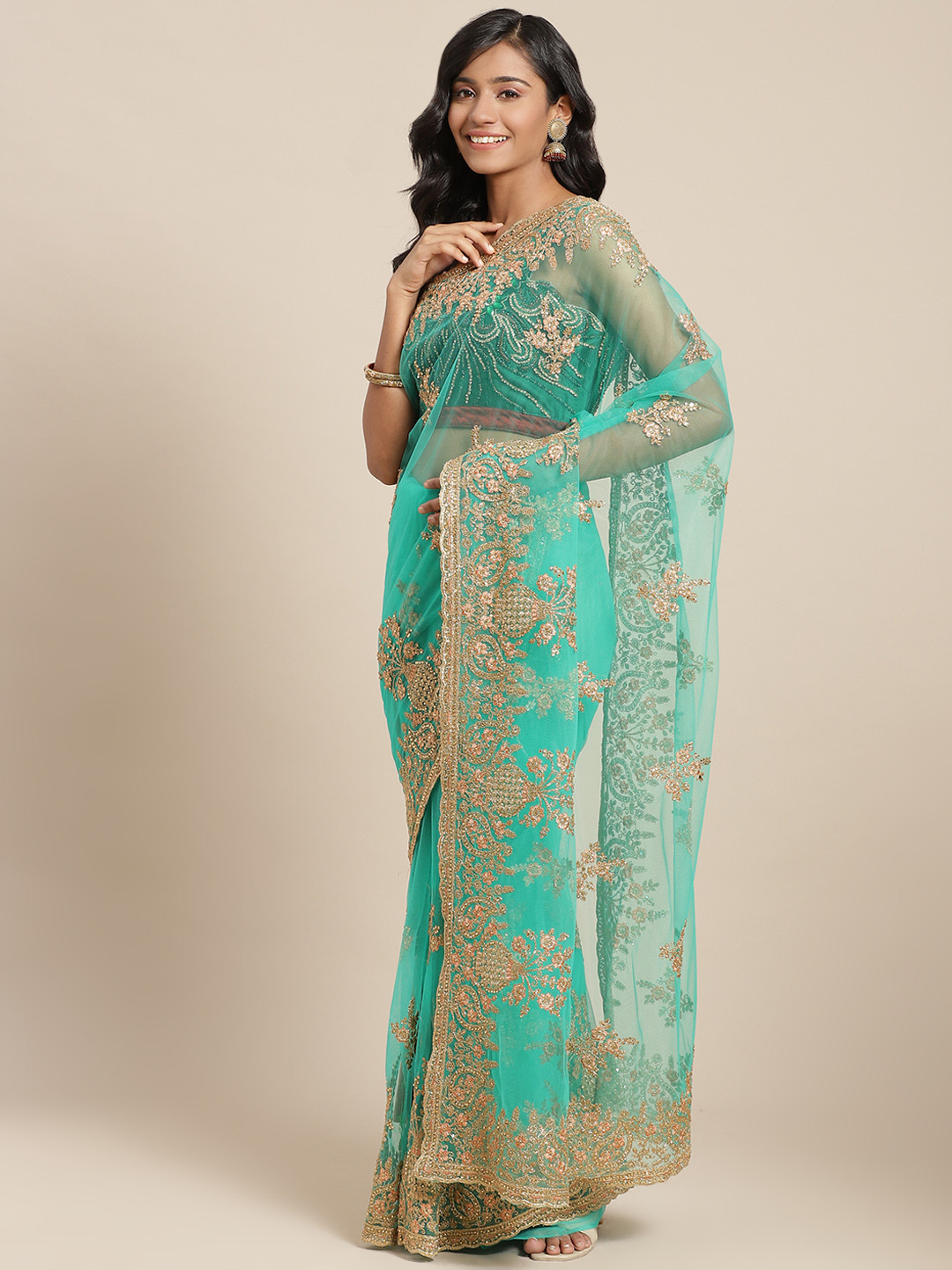 

Chhabra 555 Green & Golden Ethnic Embroidered Aari Work Net Saree
